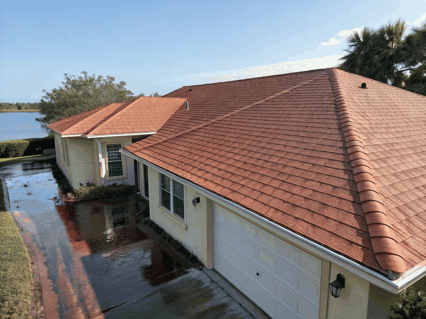 Clean residential roof free of black algae stains and debris